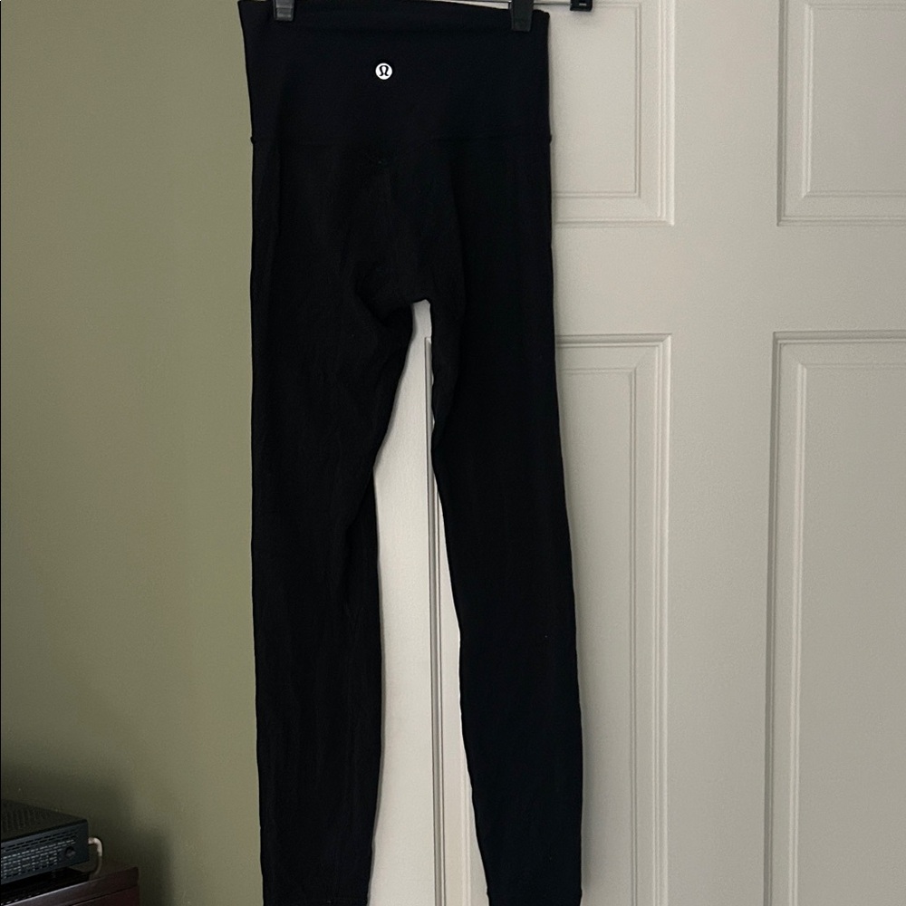 lululemon Black Leggings - their was a rip below left knee that i sewed